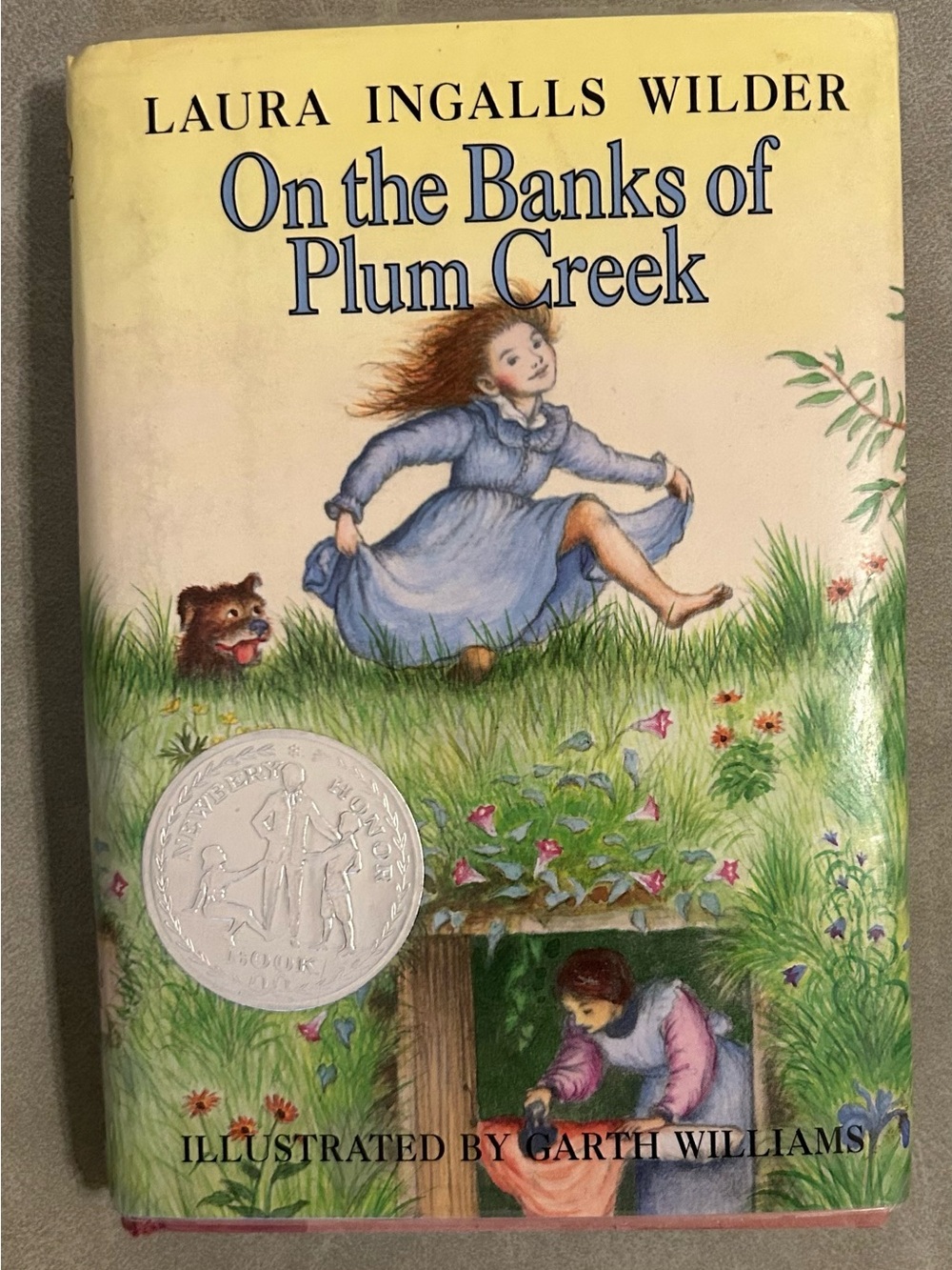 On the Banks of Plum Creek -Hardcover Book by Laura Ingalls Wilder